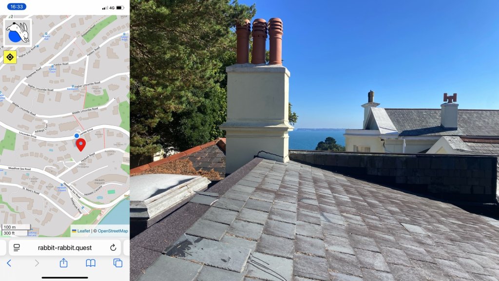 Composite image; on the left a map of the Rabbit and my location, on the right a view across a slate-tiled roof to a white chimney with three chimney pots. More slate roofs in the middle distance and a patch of blue sea in the distance. The sky is blue and there is part of a bushy tree on the left.