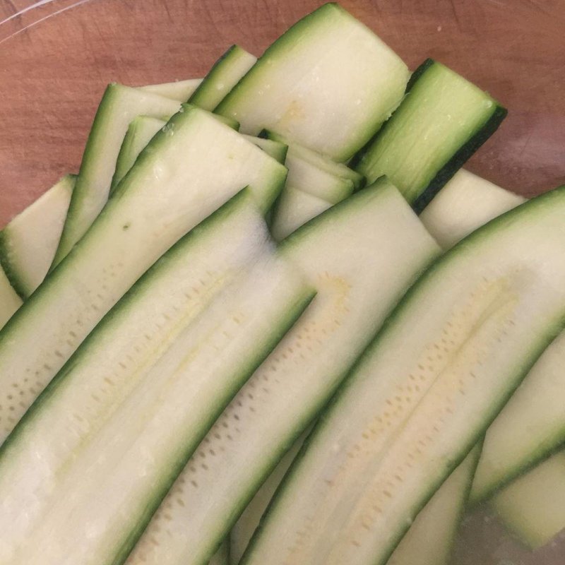 A favourite summer salad, super thin slices of zucchini bathing in lemon juice and a little salt, to be joined in an hour or so by lettuce, shavings of parmigiano and good oil.
