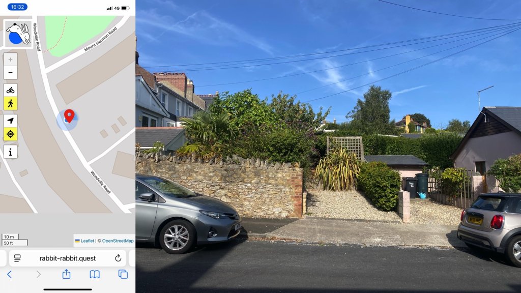 Composite image; one the left a map of the Rabbit and my location, on the right a view up a house driveway with a large Phormium at the end, a stone wall on the left and another house and its driveway on the right. Parts of two parked cars left and right.