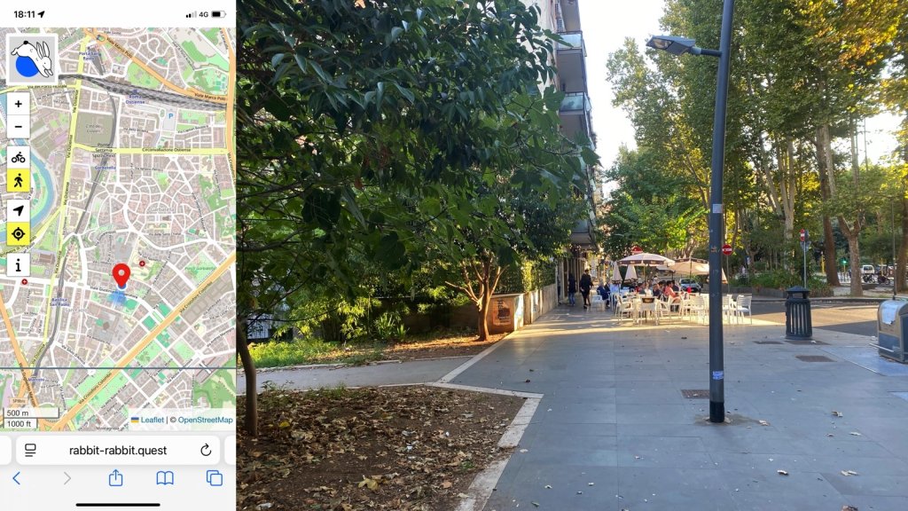 Composite image. On the left a map showing the location of the quest and my position. On the right, a view down a leafy street with a bar and umbrellas and people enjoying a drink outside. There is a large, dark green bushy tree on the left of the image, which might be privet.