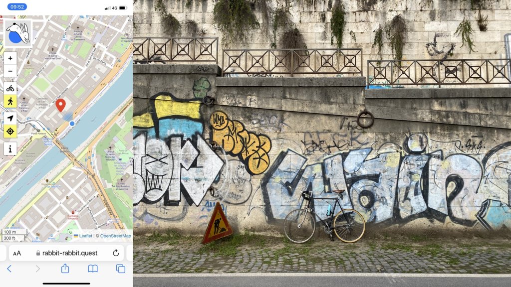 Composite image. On the left a map showing the location of the quest and my position. On the right, a vintage black Raleigh road bike leaning against a heavily graffitied wall with a men at work sign in front of it.